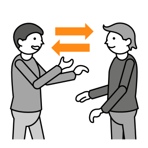 Kaksi henkilöä keskustelee piirroskuvassa. Toinen käyttää ilmaisussaan käsiä.